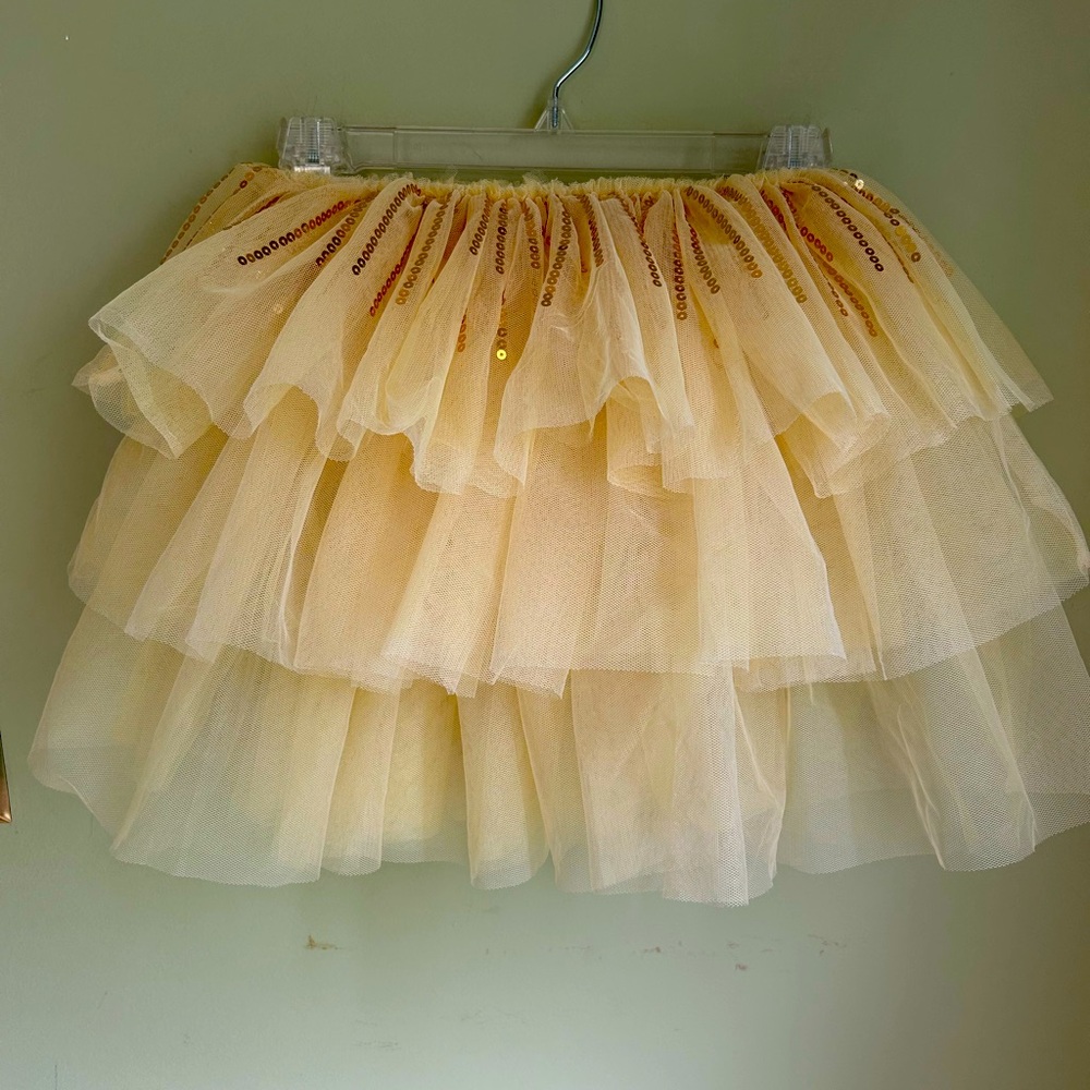 Disney Tutu . Pale yellow tulle skirt with gold sequins. 3 tier. No flaws 5/6